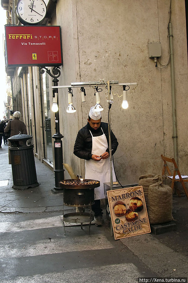 Продавец каштанов Рим, Италия Продавец каштанов Рим, Италия