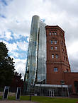 Стеклянная смотровая пристройка  к водонапорной башне с лифтом