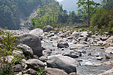 Путь все время проходил вдоль бурной и шумной реки, ударяющейся своим потоком о многочисленные камни.