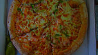Средняя пица с морепродуктами за 39 дрх.