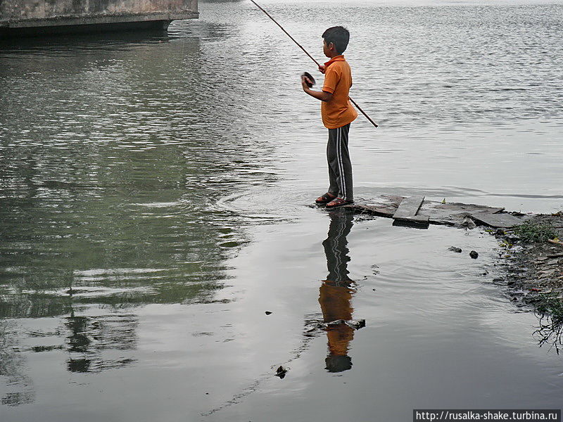 Рыбаки Западного озера Ханой, Вьетнам