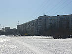 606-я серия с кирпичной вставкой на ул.Вавиловых в одном из северных районов С-Петербурга