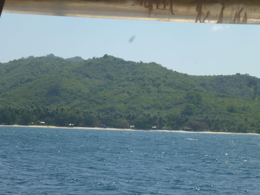 Край орущих петухов. На лодке из Бусуанги в Палаван Корон, остров Бусуанга, Филиппины
