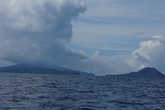 Вдали   показались   острова,   окружающие  вулкан.