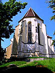 Церковь на Холме (Biserica din Deal”) – лютеранская церковь в позднеготическом стиле, в которой находится множество фреск и усыпальница. Располагается рядом с кладбищем на стороне холма, на котором много немецких надгробий.