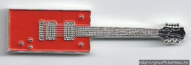 Red rectangular guitar — Bo Diddley
