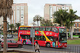 Красные экскурсионные автобусы компании City Sightseeing, хорошо знакомые туристам по всему миру.