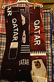 Фанатские шарфы. Мужик на шарфе  – это эмир Катара Хамад бен Халифа аль-Тани.