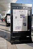 Вдоль набережной установлены стенды со старыми номерами местной газеты