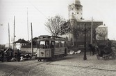 Один из первых трамваев на фоне Выборгского замка. (фото из интернета)