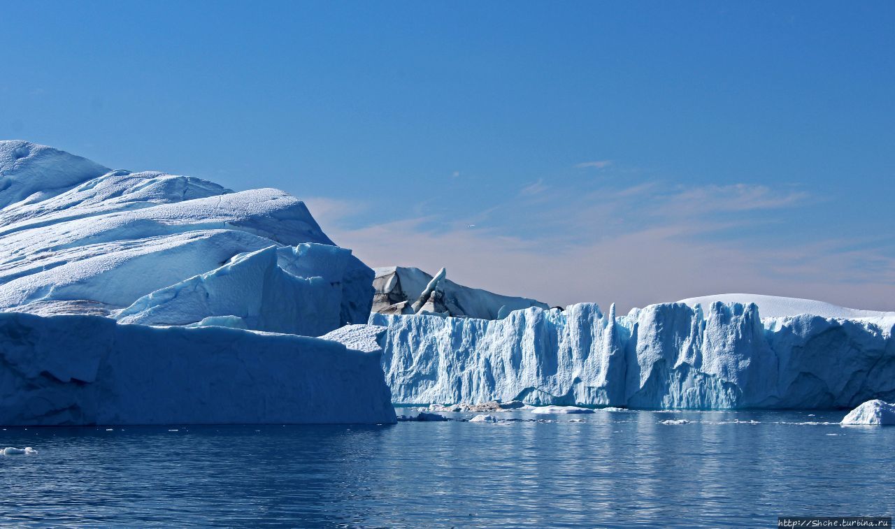 Ледовитый океан видео. Фьорд Илулиссат Гренландия. Северно Ледовитый океан канадский архипелаг. Достопримечательности Северного Ледовитого океана. Айсберг Фьорд.