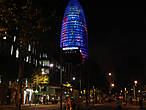 Башня Агбар — третье по высоте здание в Барселоне, поэтому, проезжая через город, вы обязательно остановите на нем свой взгляд. Тем более, что башня привлекает внимание днем свой необычной формой, а в темное время суток -яркой подсветкой. Башня Агбар заслуживает звание очередной, новейшей достопримечательности Барселоны, ведь в 2005 году ее торжественно открыл сам король Испании.