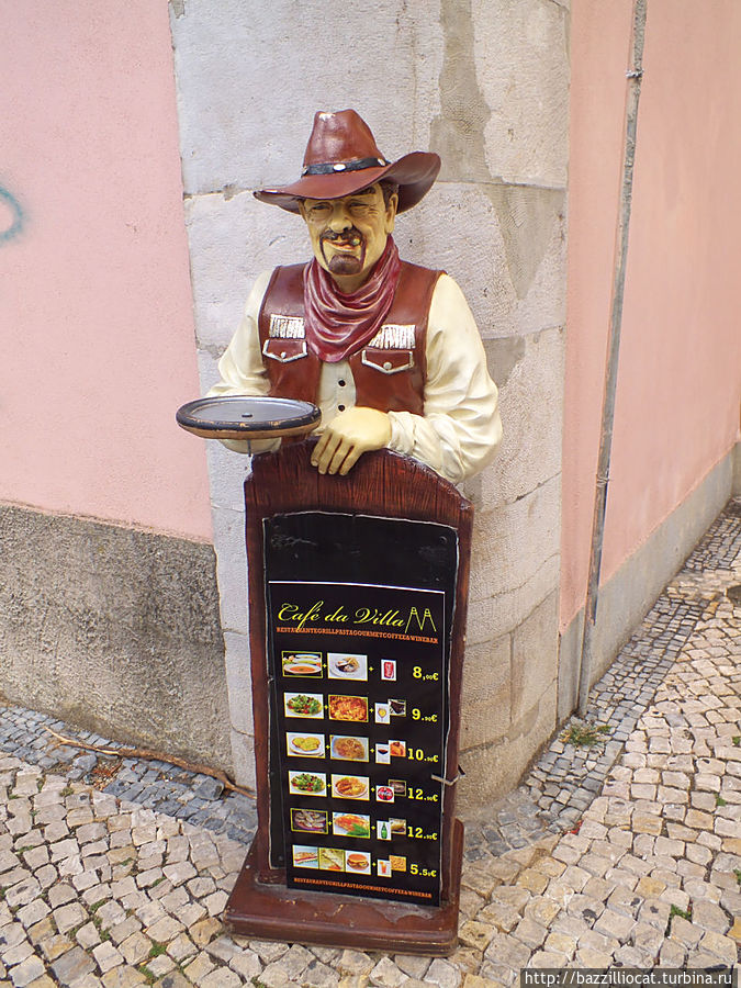 И почти у каждого кафе — ресторана вот такие штуки Синтра, Португалия