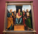 Мадонна с младенцем и святыми Петром и Павлом. Перуджино