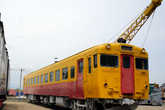 Вагон  —  дизель  поезда   Кuxa  —  58.  Построен  в  Японии  в  1963 г.  С  1963  г. по  1978 гг.  эксплуотировался  в  Японии,  затем  был  законсервирован.  В  1993 г   был  подарен  Сахалинским   ж. д.,  где  и  проработал  до  2000 г  Передан  в  музей  в  2006 г.