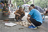 Китайцы — азартные игроки. В городе повсюду в любое время суток можно видеть играющих людей. Они играют в настольные игры, играют на музыкальных инструментах, зачастую просто так — не ради денег. Обычаи у них интересные...
*