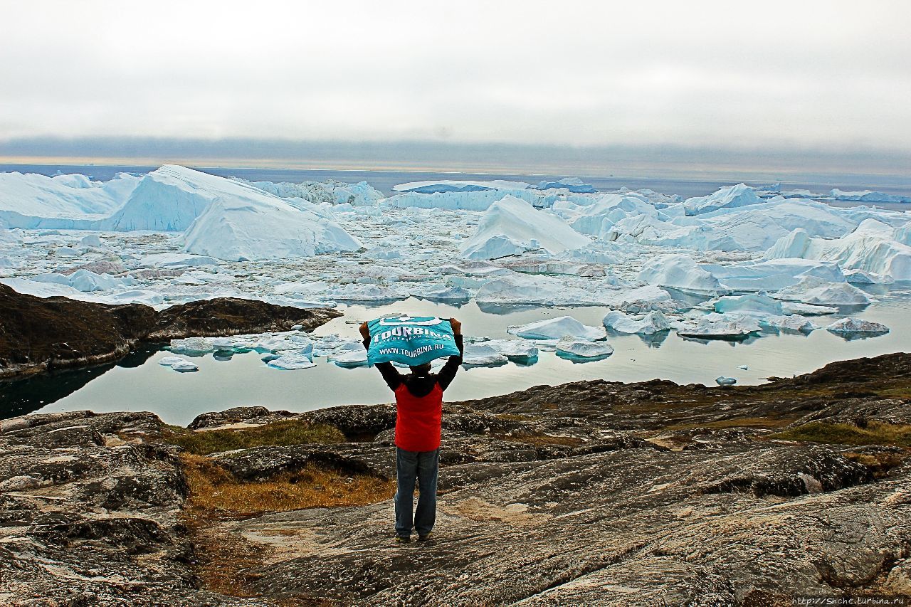 ЗаМораживающее зрелище Фьорд Илулиссат, Гренландия