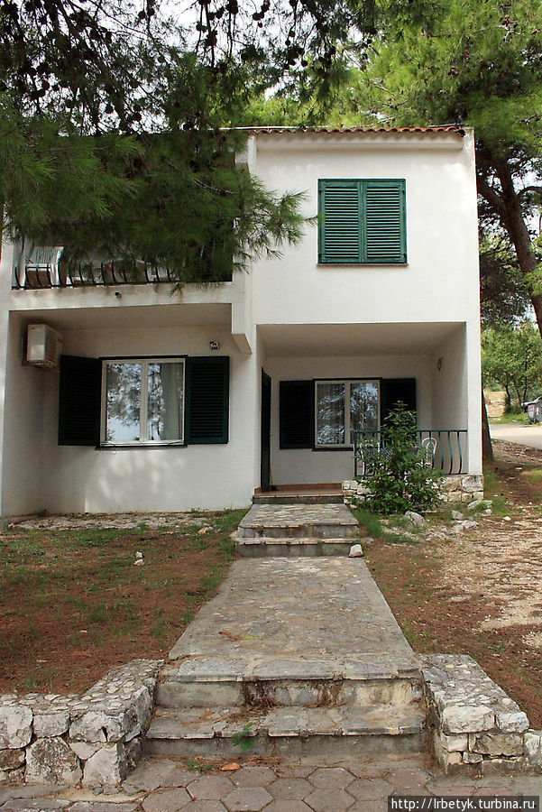 Вход в апартаменты первого этажа с террасой Сегет-Доньи, Хорватия