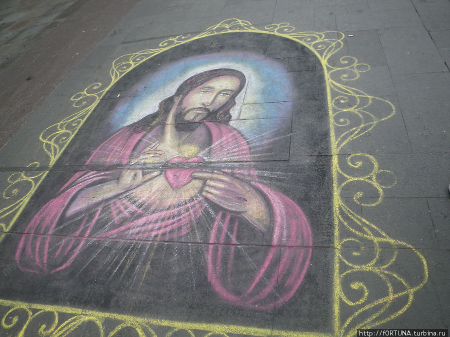 Рисунок мелом на тротуаре возле собора Сантьяго, Чили