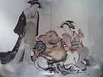 Гравюра Божество Хотей с куртизанками. Из серии Сюн-га, так называемых, весенних картинок.