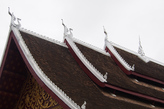 Трехслойная крыша Сима Монастыря Открытого Сердца Ват Ахам. Фото из интернета